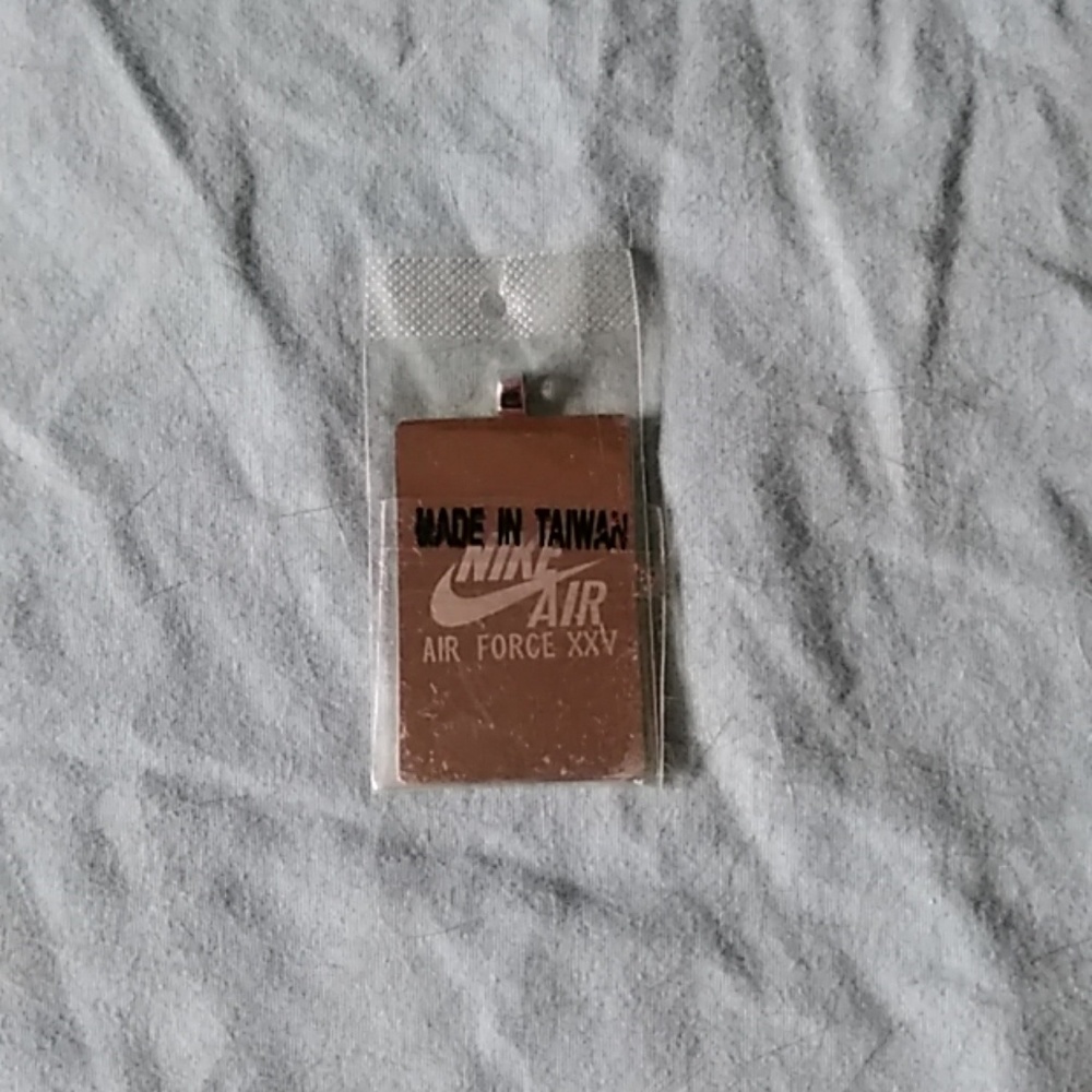 Vintage Nike dog tag